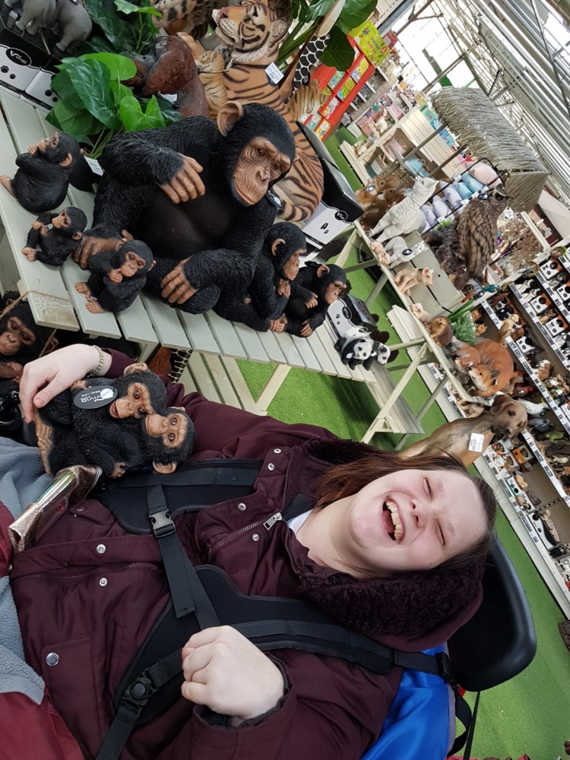Having Fun looking at ornaments in the Garden Centre!